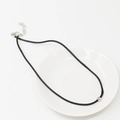 Minimalist black leather cord necklace featuring a polished silver bead pendant - Black