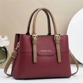 Minimalist burgundy litchi grain faux leather tote bag with tan handles and gold text - Burgundy