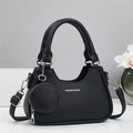 Black lychee leather crescent handbag with shoulder strap and mini round coin purse - Black