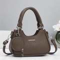 Dark brown pebble leather handbag with round coin purse and silver metal accents - Brown
