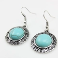 Bohemian vintage drop earrings with sky blue turquoise stones and carved alloy hooks - Hollow Round Blue Turquoise