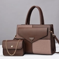 Close-up of brown two-piece bag set with gold hardware and chain strap details - Coffee