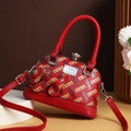 Red PU leather shell handbag with repeating HHH logo print and cute dog charm ornament - Red