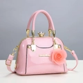 Pink patent leather fashion handbag with decorative rose and adjustable shoulder strap - Rose Pink