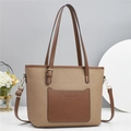 Chic two-tone canvas tote bag with brown leather trim and adjustable shoulder strap - Khaki