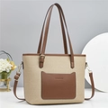 Canvas and brown leather bucket bag with top handles and adjustable shoulder strap - Apricot