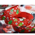 Macro detail of red Christmas grosgrain ribbon with snowflake and glove patterns - 2.5cm Red Christmas Gloves Print Ribbon (1 Yard)