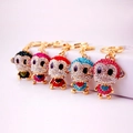 Colorful rhinestone monkey car keychains in gold metal finish with crystal heart - Random Color