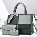 Detail view of crocodile pattern patchwork tote bag set with gold chain and hardware - Green