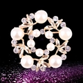 Golden flower brooch featuring white pearls and clear rhinestones on a black background - xz4012 Gold Leaves