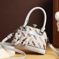 White shell crossbody bag with H-pattern print and crystal knob closure for women - White