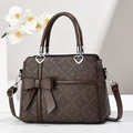 Deep brown crossbody handbag with monogram pattern and leather bow charms - Dark Brown Monogram Cylinder Handle (Style 5)