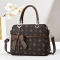 Classic dark brown Boston handbag with star patterns and a decorative bow ornament - Dark Brown Boston Style (Style 6)