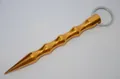 Macro detail of gold metal tactical kubotan keychain with non-slip grip for self-defense - Pointed Head Gold