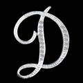 Close-up of a silver letter D brooch featuring sparkling crystal rhinestones on black background - Letter D / Silver