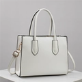 Elegant white Saffiano faux leather tote bag with black edge trim and crossbody strap - White