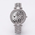 Luxury women's silver steel watch with sparkling rhinestones and a 3D leopard dial - Silver