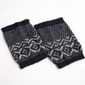 Detail of navy and cream geometric knit leg warmers with ribbed cuffs on white background - Navy Blue/Light Gray