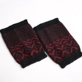 Detailed view of knitted leg warmers with black and red geometric jacquard pattern - Black/Wine Red