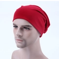 Red candy-colored slouchy knit beanie hat with smooth stretch fabric texture for unisex wear - Burgundy