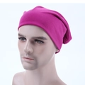 Detailed close-up of a magenta cotton knit slouchy beanie cap on a male head mannequin - Light Purple