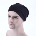 Classic black knitted slouchy beanie for men and women shown on a head mannequin - Black
