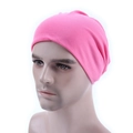 Close-up of pink knitted beanie on a male mannequin head with soft fabric detail - Pink