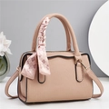 Elegant dusty pink textured leather handbag with decorative scarf and shoulder strap - Pink