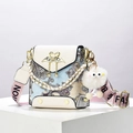 Fashionable paisley crossbody bag with leather flap and pink lettered strap on white stand - Off-white