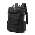Dark grey canvas backpack with brown leather accents and multi-pocket storage design - Black