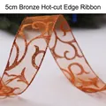 Cinta navideña bronce 5cm transparente con flores de purpurina dorada y bordes quemados - 5cm / Borde Quemado / Bronce