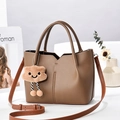 Brown lychee leather bucket bag with cute plush pendant and wave edges for women - 23cm x 10cm x 18cm / Dark Khaki