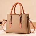 Beige and brown vintage trapezoid handbag with dual handles and adjustable strap - Fabric Khaki