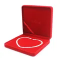 Detail view of a red velvet jewelry box featuring an elegant heart-shaped pearl necklace - Heart Necklace Box 19*19*4CM / Red