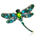 Vintage dragonfly brooch with colorful rhinestones on gold metal and a white background - Peacock Green