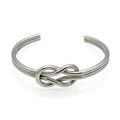 Polished silver stainless steel knot cuff bracelet with a minimalist knotted bow design - Inner Diameter 60mm / Steel
