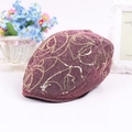 Detail of dark purple beret hat featuring intricate gold sequin floral embroidery and metallic finish - Adjustable / Red