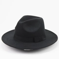 Detailed view of the wide brim and textured black felt ribbon on this wool jazz fedora - 56-59cm Adjustable / Black