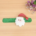 Green sequined Christmas slap bracelet with plush Santa Claus on a light wood surface - T1-25 Non-glowing Santa Sequin