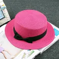 Flat top rose red straw hat with elegant black bow ribbon on a fashion magazine - M / Flat Top Plain / Rose Red
