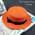 Summer orange flat top straw hat with a black bow ribbon on a fashion magazine - M / Flat Top Plain / Orange