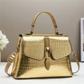 Elegant gold crocodile pattern handbag with handle and adjustable strap for women - Gold