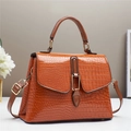 Brown crocodile pattern top handle crossbody bag for women on minimalist desk - Khaki/Earth Yellow
