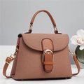 Detail of brown twill fabric handbag with leather handles and gold metal clasp closure - Khaki/Earth Yellow