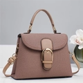 Detail showing brown twill fabric texture and leather trim with golden horseshoe buckle - Brown