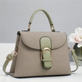 Elegant beige textured trapezoid handbag with light green handle and gold horse-bit buckle - Green