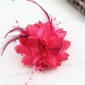 Detailed view of rose red floral hair accessory with feathers, mesh and pink beads - Rose Red