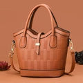 Elegant orange-brown bucket bag with woven texture and gold hardware details - L20 W12 H23 / Earthy Yellow