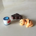 Detailed view of miniature resin figurines featuring a jar, chocolate, and a sleeping cat - Cat, Jar And Chocolate