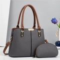 Schickes zweiteiliges Set aus grauer Stoff-Tote-Bag und Tasche mit braunen Ledergriffen - Grau